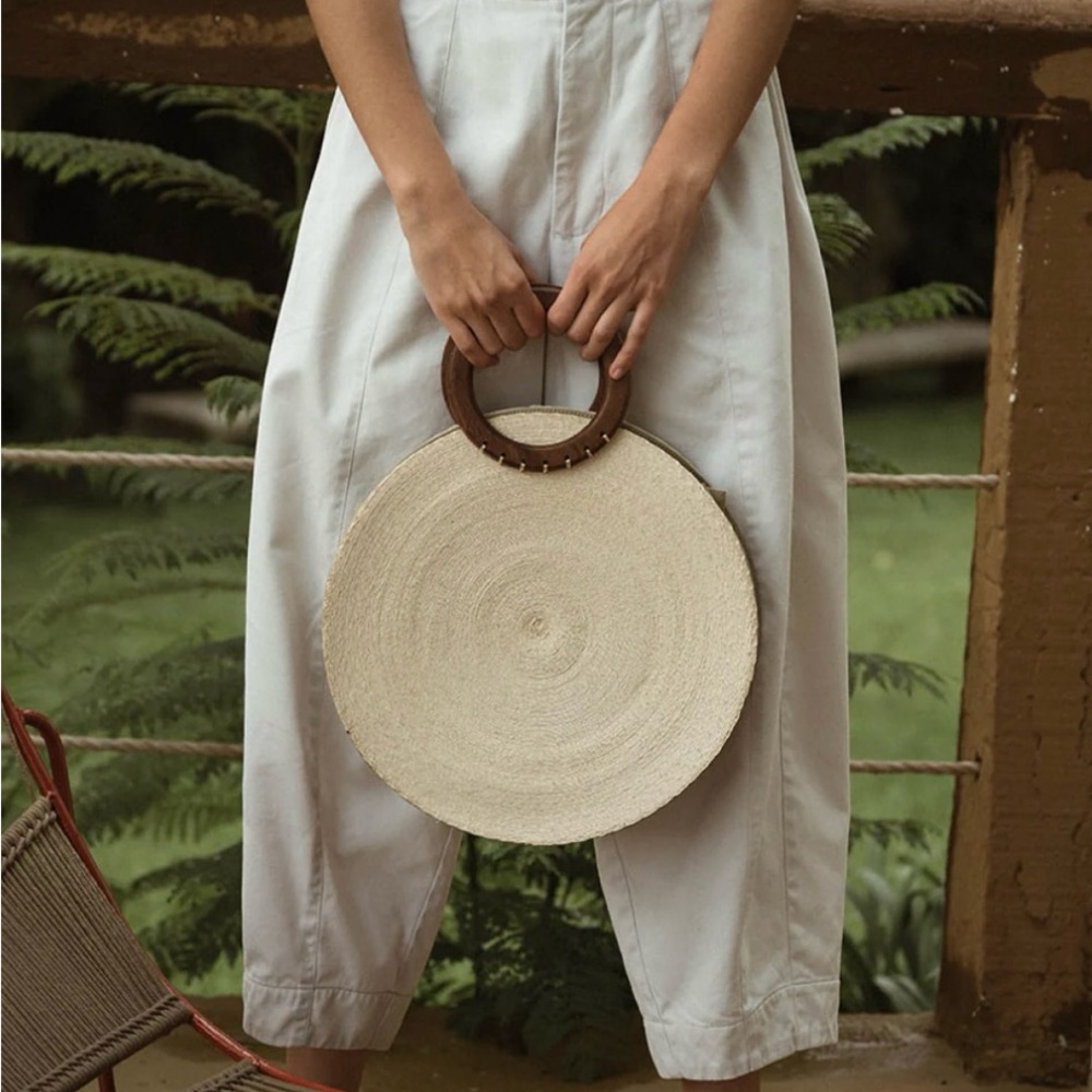 Elegant Cream Circular Handbag- convertible satchel